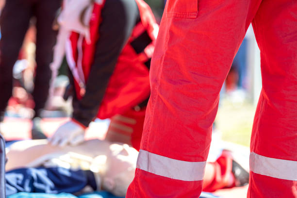 istock CPR - Cardiopulmonary resuscitation and first aid class after accident 1427551722