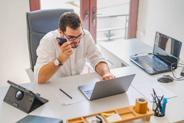 istock Young businessman working on laptop at his office 1427556217