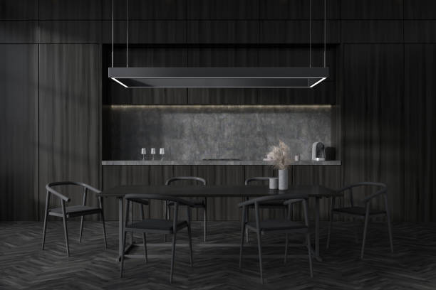 istock Grey kitchen interior with seats and eating table on wooden floor 1427556436