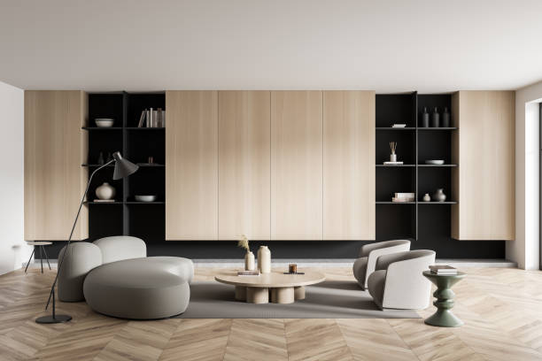 istock Light relax room interior with couch and armchairs, coffee table. Empty wall 1427556799