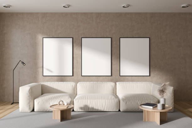 istock Light relaxing room interior with couch and decoration. Mockup frames 1427557938