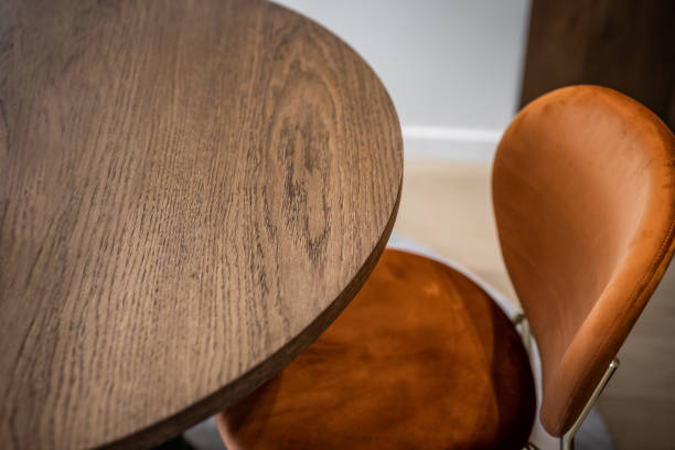 istock Wooden dining table and chair, selective focus, background 1427559799