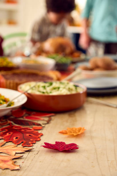 Decorations On Table Set For Thanksgiving Meal At Home