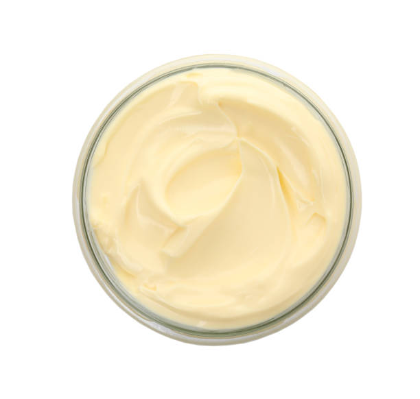 istock Jar of delicious mayonnaise isolated on white, top view 1427565621