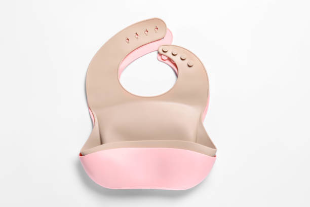 istock Color silicone baby bibs isolated on white, top view 1427567711