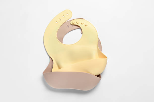 istock Color silicone baby bibs isolated on white, top view 1427567735