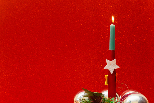 Christmas ornaments on red background, new year concept. Digitally generated image.