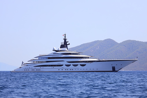Bodrum, Turkey, 10 September 2022: A new one has been added to the luxury yachts arriving in Bodrum, the favorite tourism district of Muğla. The super-luxury yacht Ahpo, which is said to be owned by Jamaican billionaire Michael Lee Chin, docked in Bodrum.