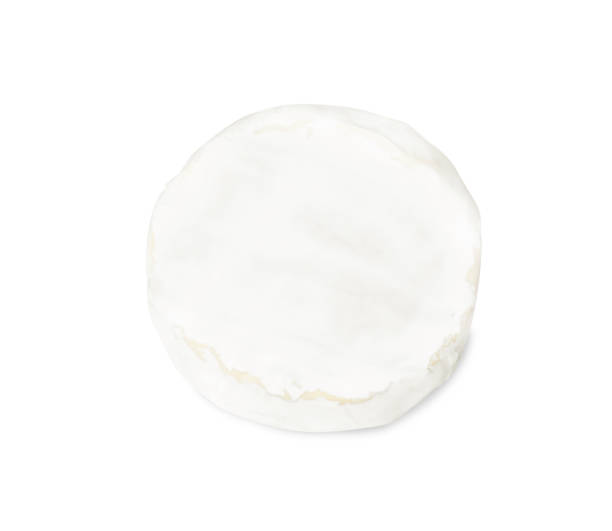 istock Tasty brie cheese isolated on white, top view 1427569532