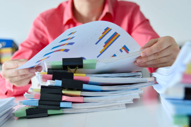 istock Accountant woman hands sorting business reports 1427572225