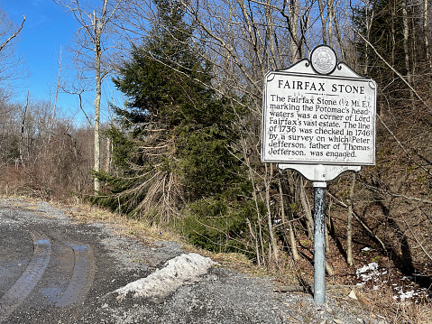 Tucker County, West Virginia, USA - February 21, 2022: Historical roadside marker for the “Fairfax Stone”, the western border of Lord Fairfax’s property in colonial America.