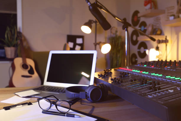istock Professional audio equipment on table in modern radio studio 1427579208