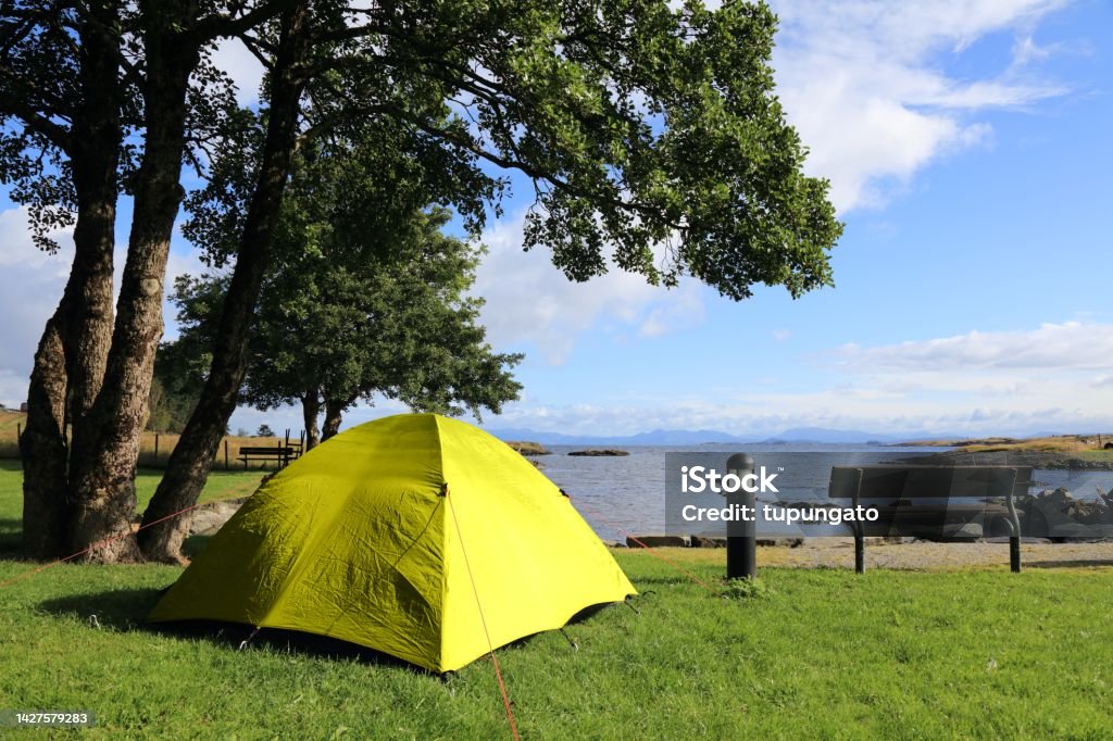 Camping in Norway Norway campsite with small tent. Rennesoy island outdoor vacation. Rogaland county. Adventure Stock Photo