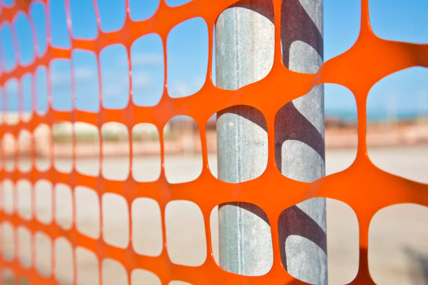 istock Plastic safety grid in construction site areas for the protection of construction activities 1427584503