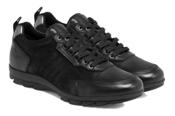 istock Black Leather Men's Shoes On White Background 1427587468