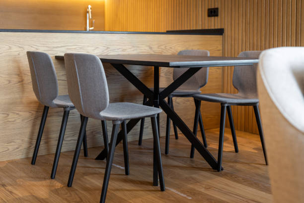 istock Modern dining table with chairs in luxury apartment 1427589157