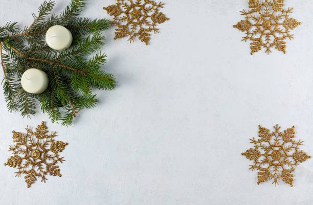 istock christmas snowflakes with candles on a light background. Selective Focus. A place to copy. view from above. Christmas, New Year card. 1427593429