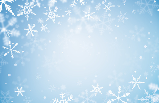 winter background with snowflakes on a light blue background