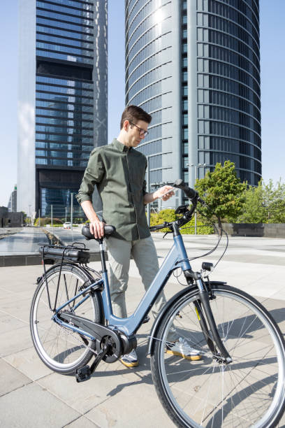 istock businessman rides e-bike 1427594644