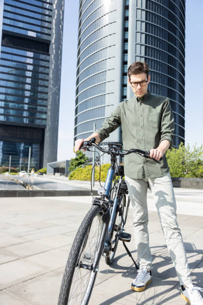istock businessman rides e-bike 1427594656