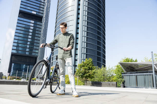 istock businessman rides e-bike 1427594668