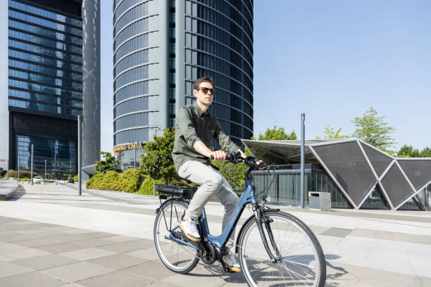 istock businessman rides e-bike 1427594742