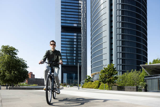 istock businessman rides e-bike 1427594743