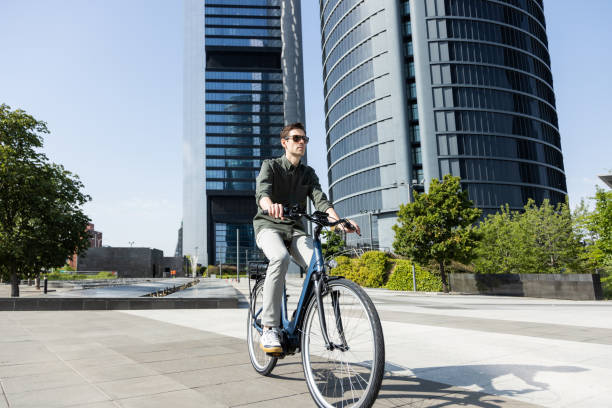 istock businessman rides e-bike 1427594750