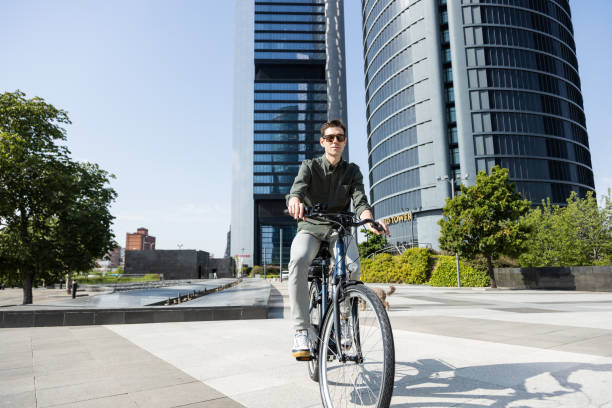 istock businessman rides e-bike 1427594763