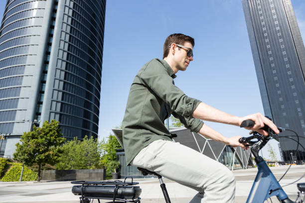 istock businessman rides e-bike 1427594771