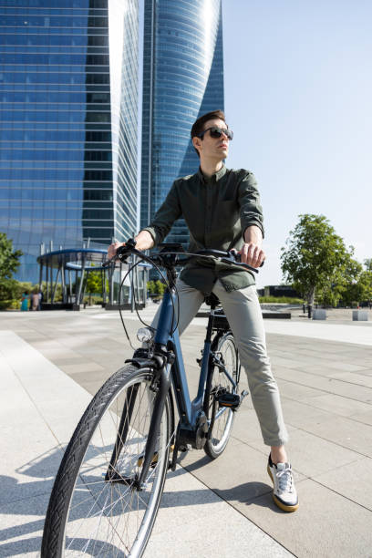 istock businessman rides e-bike 1427594823