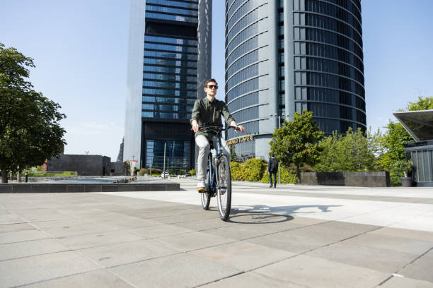 istock businessman rides e-bike 1427594825