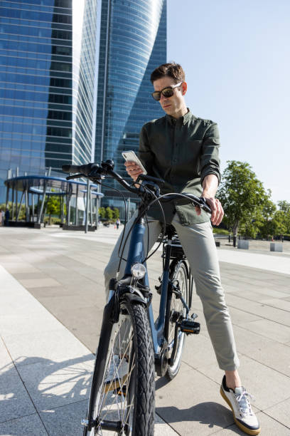 istock businessman rides e-bike 1427595011