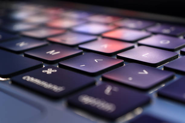 istock macro keyboard laptop with purple color 1427595121
