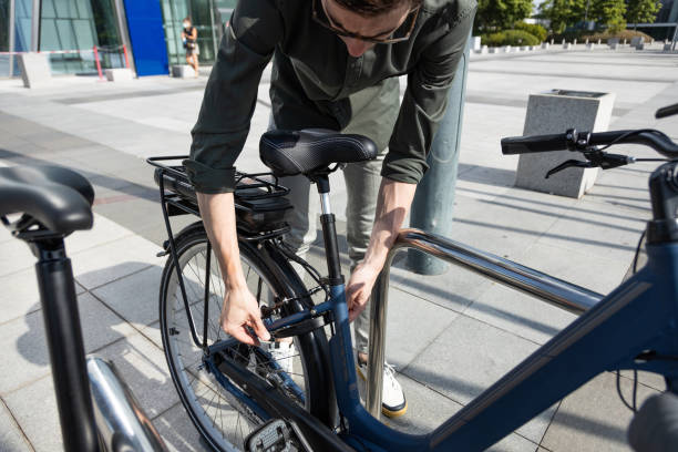 istock businessman rides e-bike 1427595129