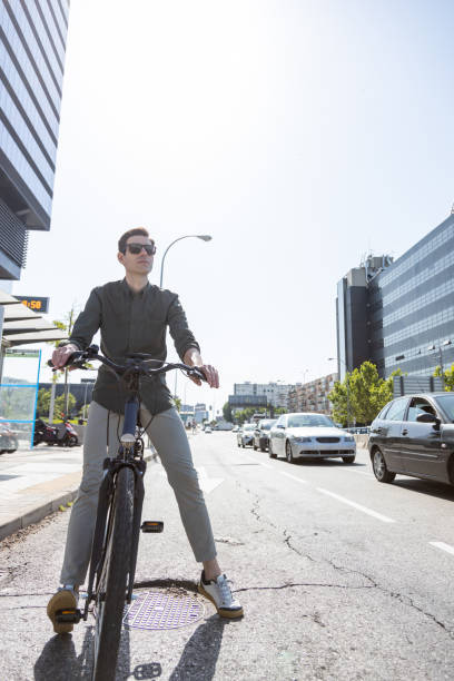 istock businessman rides e-bike 1427595311
