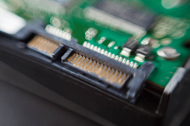 istock Detail of hard disk connection on top of a table 1427596030