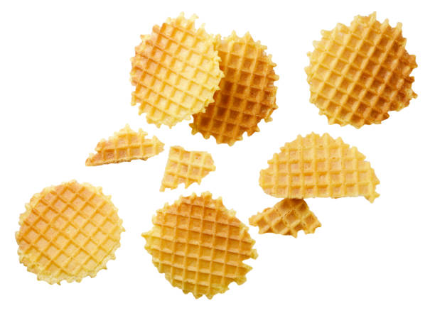 istock Wafers and broken pieces are flying on a white. Isolated 1427596066