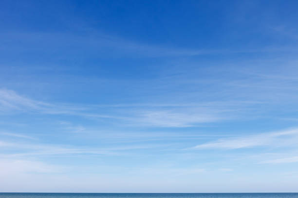 istock Beautiful blue sky with cirrus clouds over the sea. Skyline. 1427596943