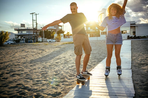 Free Stock Photo of Man Riding Skateboard on Sandy Beach | Download ...