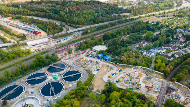 istock Large construction site of a highway bridge - aerial view 1427598972