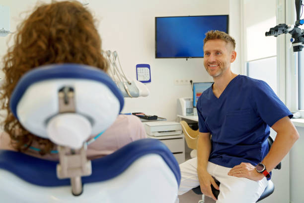 istock Dentist having consultation with patient in his ambulance. 1427599328