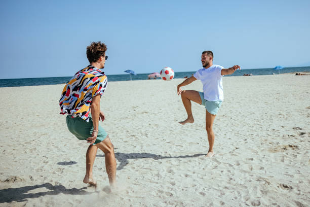 istock Friends having fun at the beach 1427601714