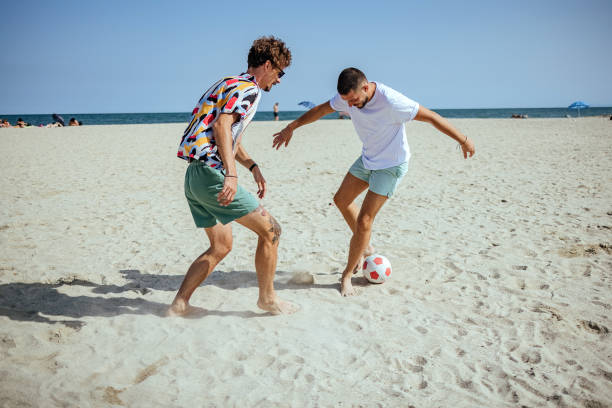 istock Friends having fun at the beach 1427601747