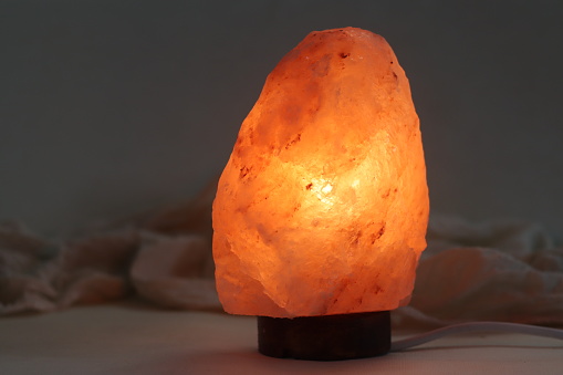 Himalayan pink salt crystal lamp. Lamp handcrafted with rare crystals which are 250 million year old