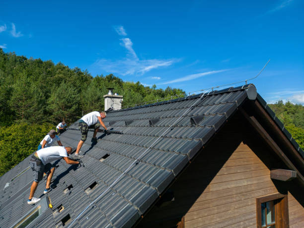 istock Men worker installing solar photovoltaic panels on roof, alternative energy, saving resources and sustainable lifestyle concept. 1427608902