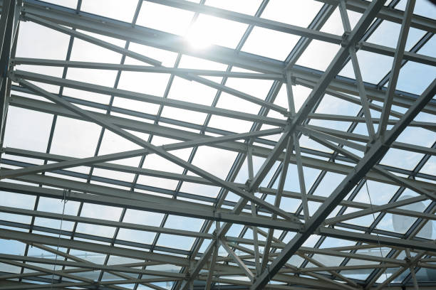 istock Sunlight breaks through abstract metal frame and glass wall 1427608952