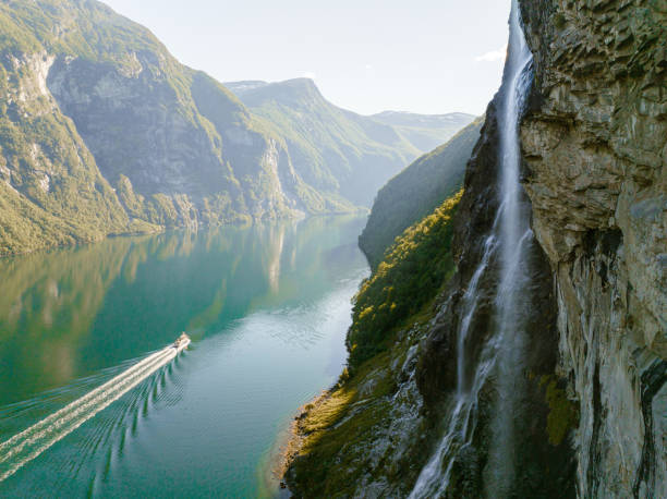 Aerial view of cruise ship near Seven sisters waterfall Scenic aerial view of cruise ship near Seven sisters waterfall geirangerfjord stock pictures, royalty-free photos & images