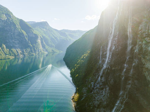 Aerial view of cruise ship near Seven sisters waterfall Scenic aerial view of cruise ship near Seven sisters waterfall geirangerfjord stock pictures, royalty-free photos & images