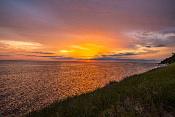 View of a Lake Michigan sunset on a cloudy day from Muskegon State Park in Western Michigan